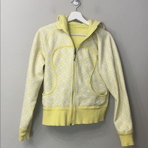 Lululemon yellow pattern reversible jacket.